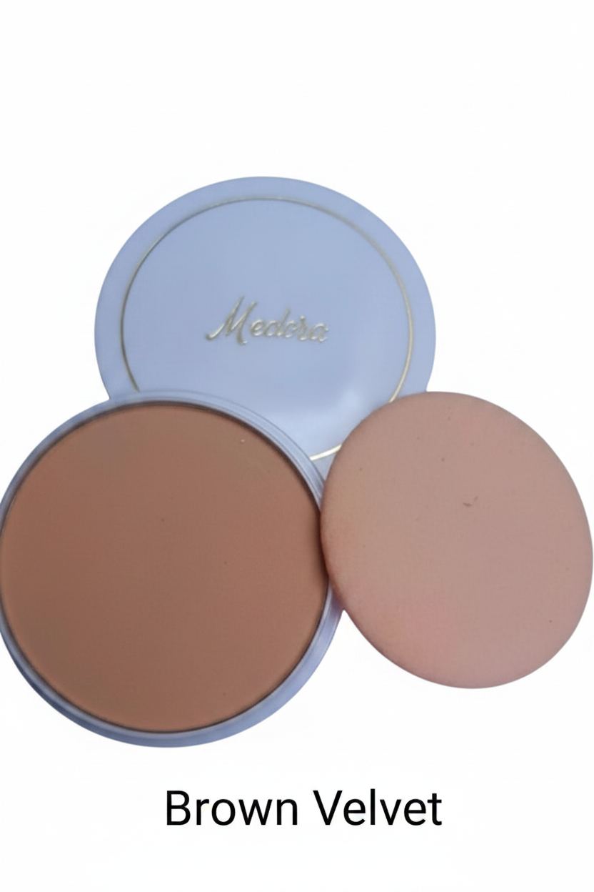 Medora face powder compact in Ocre; long-lasting matte pressed powder for a smooth complexion