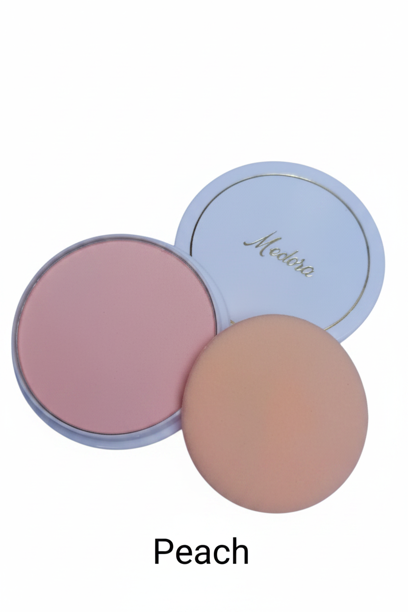 Medora face powder compact in Peach; long-lasting matte pressed powder for a smooth complexion